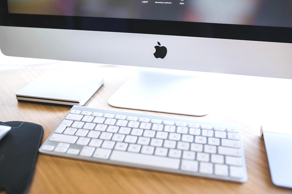 Executive home office setup with premium wireless peripherals